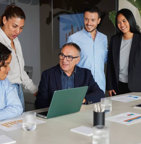 Multiracial business people working together inside modern office sharing ideas - Multi generational colleagues and entrepreneur concept
